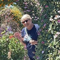 May be an image of 1 person and flower